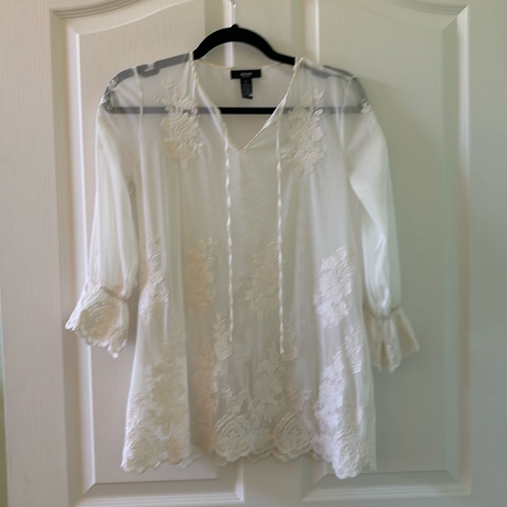 Beautiful white blouse with white embroidery